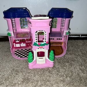 Fisher-Price sweet streets Pink Dollhouse with purple roof